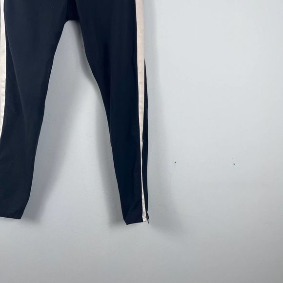 Athleta Metro Tux Stripe Black Chaturanga Ankle Zip Side Stripe cropped Leggings - Picture 4 of 16